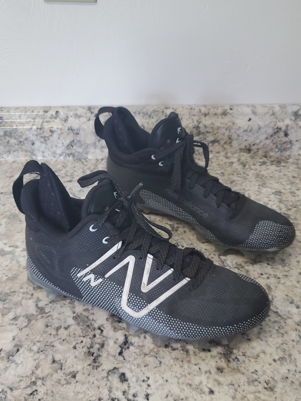 NEW BALANCE FREEZE Men’s Black LACROSSE Cleats with White Accents